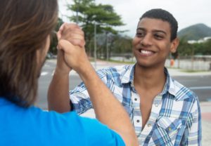 two men greeting